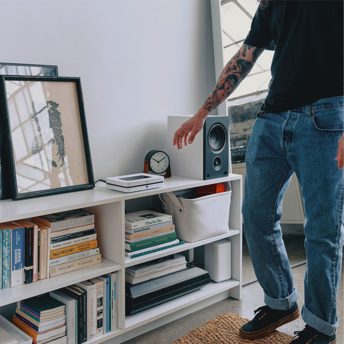 Bluesound Node (N132) Wireless Network Streamer lifestyle view, in listening room