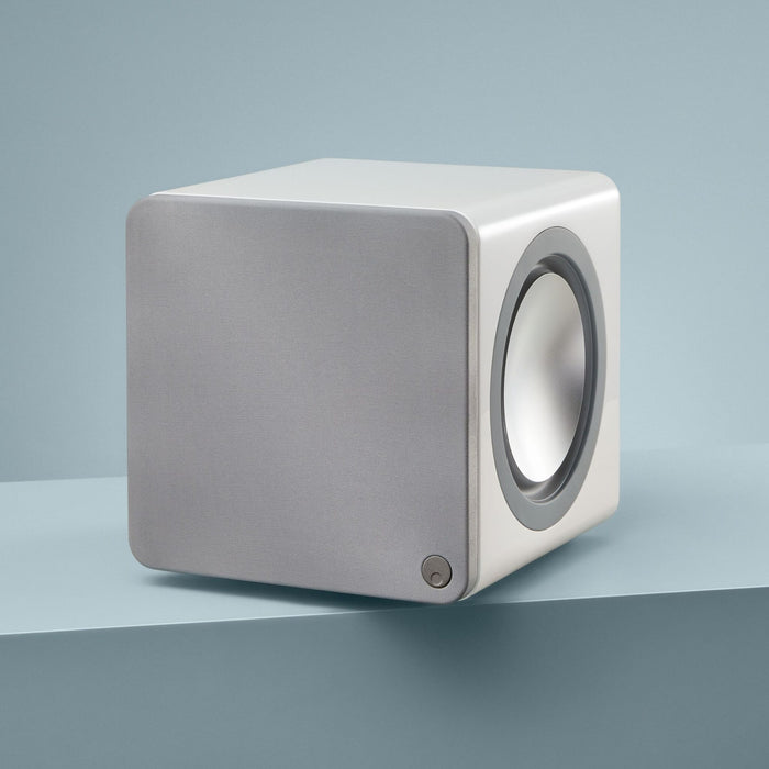 product highlight in green background showing the sleek white finish of the x201 subwoofer