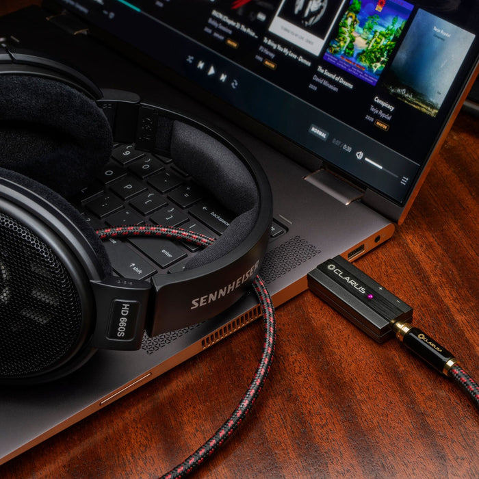 Clarus CODA USB DAC lifestyle photo, with PC and Sennheiser headphones
