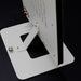 Diptyque DP115 Isodynamic Floorstanding Speaker, white stand detail view