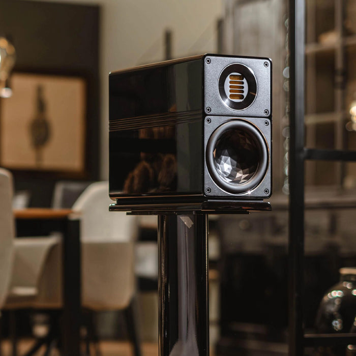 ELAC Elegant BS312.2 Bookshelf Speakers, gloss black lifestyle photo, in living room