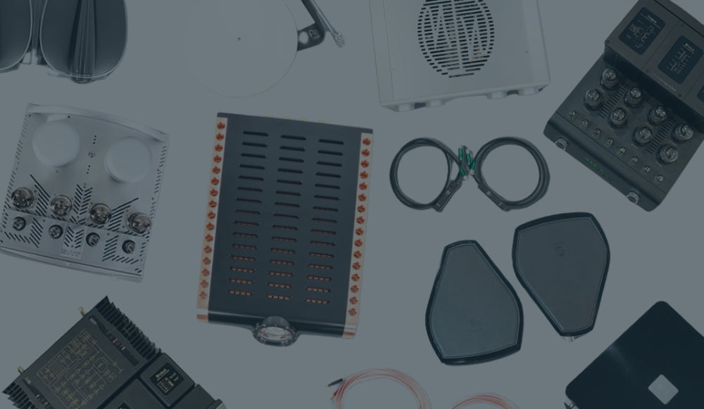 Assorted collection of gear including ModWright integrated amp, D'Agostino monoblock, BAT tube amp, Bowers and Wilkins speakers, Cardas cables, and more