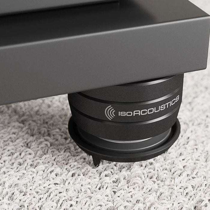IsoAcoustics Gaia Neo Carpet Disc with isolator in place on top under speaker