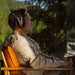 Person listening to Meze 105 Silva Open-Back Headphones