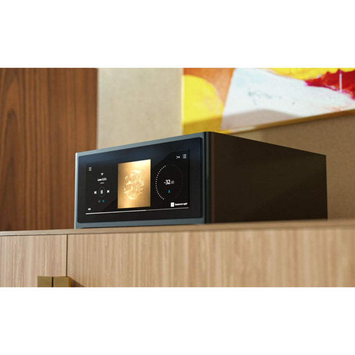NAD M10 V3 BluOS Streaming Amplifier in audiophiles listening room