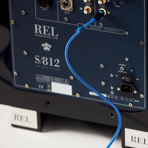 REL Commodore Subwoofer Cable connected to REL subwoofer