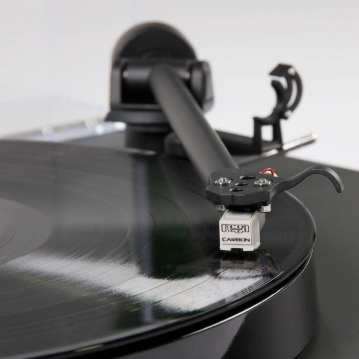Rega Planar 1 Belt-Drive Turntable, matt black closeup, cartridge on record in use