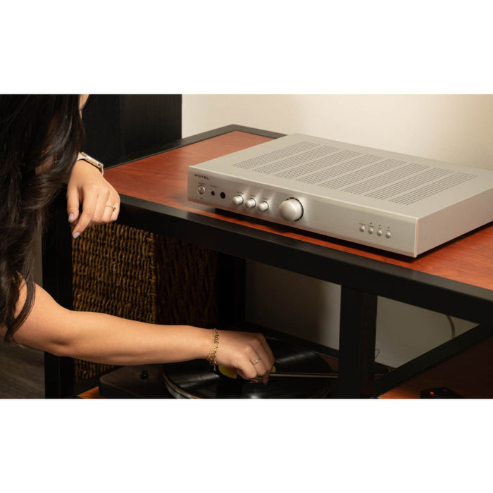 Rotel A8 Stereo Integrated Amplifier, lifestyle photo showcasing sleek design