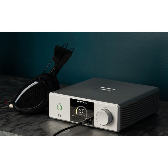 Rotel DX-3 Headphone Amplifier, lifestyle photo showcasing sleek design