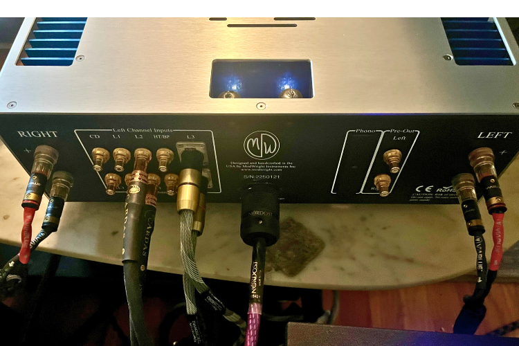 A complex, balanced, and resolving system—like this ModWright amplifier with a loom of Nordost and Cardas—is the ideal foundation for cable-led refinements. A complex, balanced, and resolving system—like this ModWright amplifier with a loom of Nordost and Cardas—is the ideal foundation for cable-led refinements.