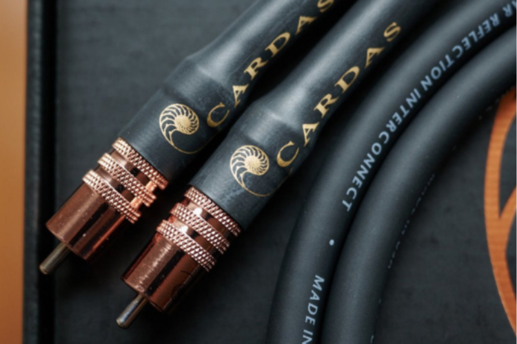 Close-up of Cardas Clear Reflection Interconnects featuring Matched Propagation technology to improve soundstage depth and instrument separation. Close-up of Cardas Clear Reflection Interconnects featuring Matched Propagation technology to improve soundstage depth and instrument separation.